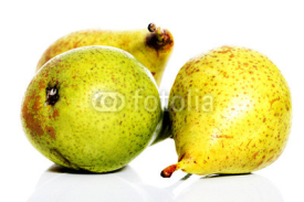 Naklejki Three fresh pears over white.