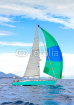 Naklejki Sailing boat during a regatta out of Poros island in Greece
