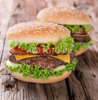 delicious hamburger on wood