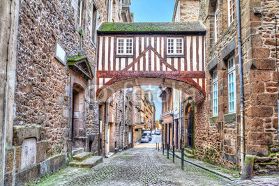 Wooden brigde between two buildigs on narrow street in Saint-Malo, Brittany, France