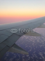 Naklejki puesta de sol desde el avion