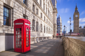 Fototapety Traditional red british telephone box with Big Ben and Double Decker bus at the background on a sunny afternoon with blue sky and clouds - London, UK