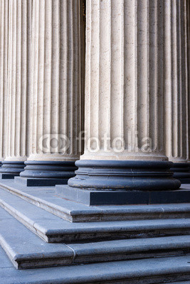 Close-up of columns with stairs