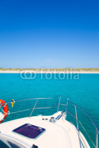 Fototapety Boat anchored in Formentera Espalmador island