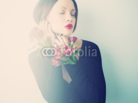 Obrazy i plakaty Beautiful lady with flowers
