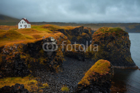 Naklejki Landscape of Iceland, lonely house on the ocean, fog and rain. A journey into a far country