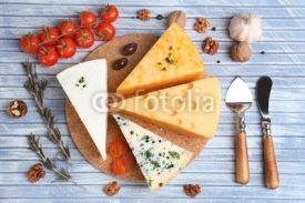 Obrazy i plakaty Different Italian cheese on wooden table