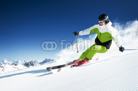 Fototapety Skier in mountains, prepared piste and sunny day