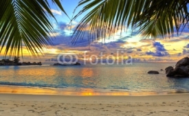 Fototapety Tropical beach at sunset