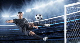 Naklejki Hispanic Soccer Player kicking the ball
