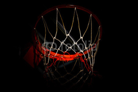 Fototapety Basketball hoop on  black background with light effect