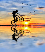 Fototapety el ciclista y el sol