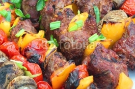 Close-up Of Assorted Beef, Tomato, Pepper and Mushrooms Kebabs