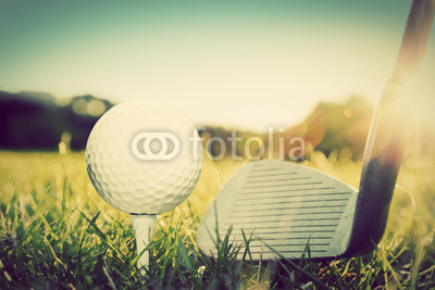 Playing golf, ball on tee and golf club. Vintage, retro style