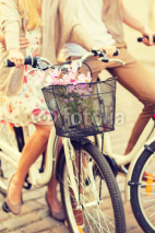 Fototapety couple with bicycles in the city