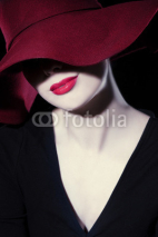 Naklejki Beautiful woman with hat and red lips