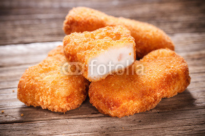 Nuggets on Wood Background
