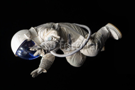 Naklejki astronaut on black background