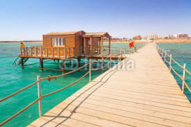 Naklejki Wooden pier with change room house on Red Sea in Egypt