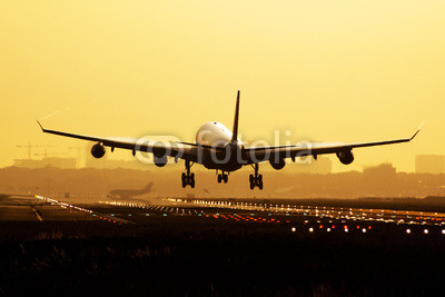 Airplane sunrise landing