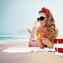 Pin-up girl on the beach