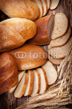 Naklejki Bread and wheat. Food background.