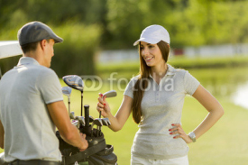 Naklejki Young couple at golf cart