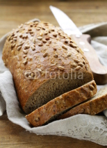 Fototapety loaf of rye bread with sunflower seeds