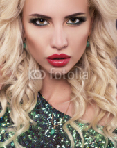 portrait of sexy woman with blond hair and bright makeup