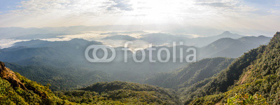 beautiful scenery with cloudy sky, cloudy sea, sunshine, mountains and forest. 