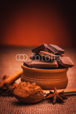 pieces of chocolate with spices, cinnamon, star anise