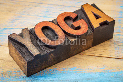 yoga word in vintage wood type