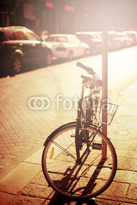 Bicycle resting at the street