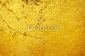 Golden background old surface cracking.