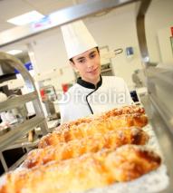 Naklejki Bakery student preparing viennese pastries