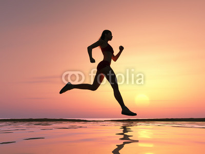 Woman running on the beach
