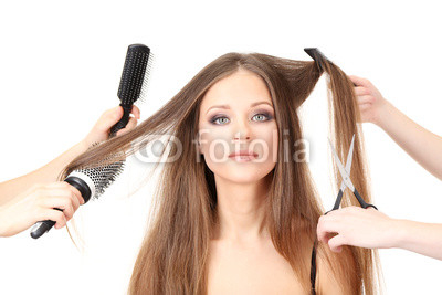 Woman with long hair in beauty salon, isolated on white