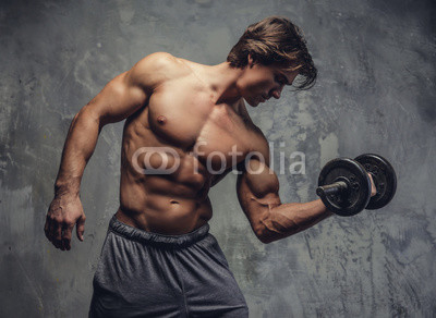 Shirtless muscular man doing biceps workout.