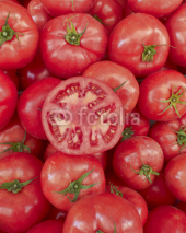 Naklejki juicy tomato cut, natural background
