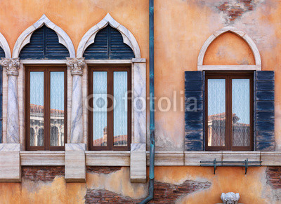 Old arched windows of Venetian house